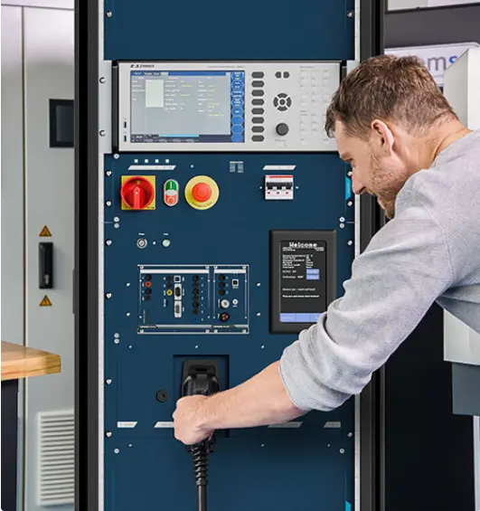 Production technician connecting an Easy Chester EOL system