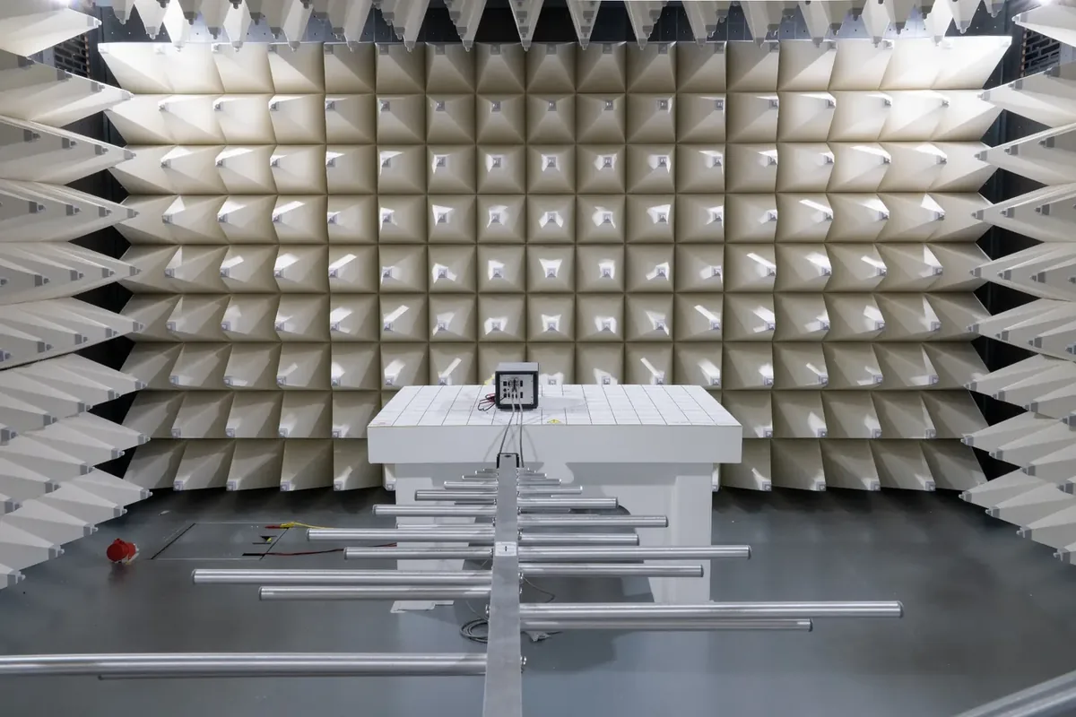 EMC Link test setup and measurement antenna inside the EMC chamber